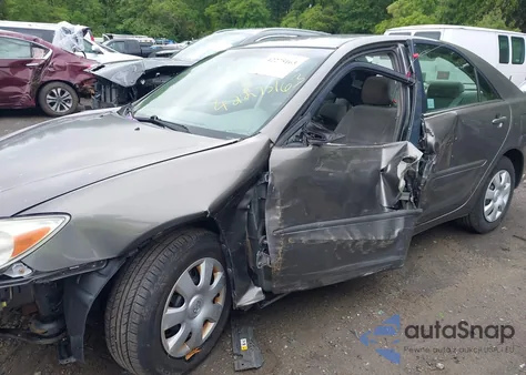 2003 Toyota Camry Le z USA, uszkodzony, nr VIN 4T1BE32K63U648929